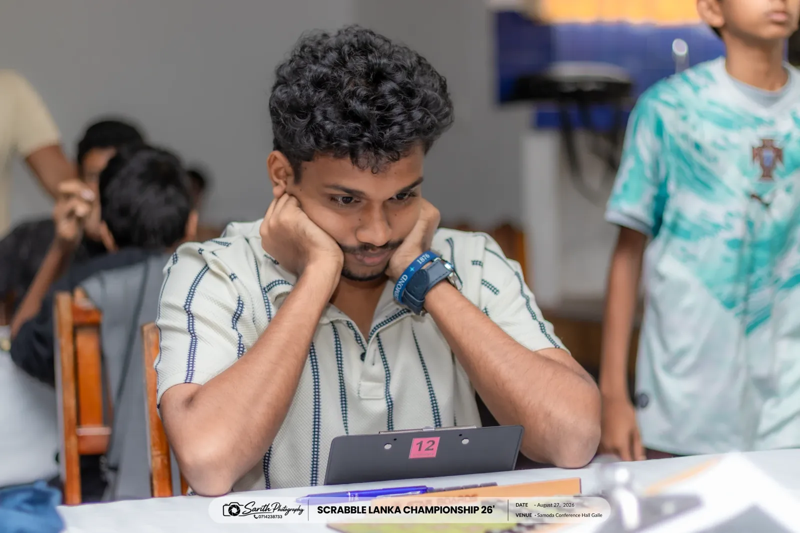 Nimuthu deep in thought at the Scrabble Lanka Championship