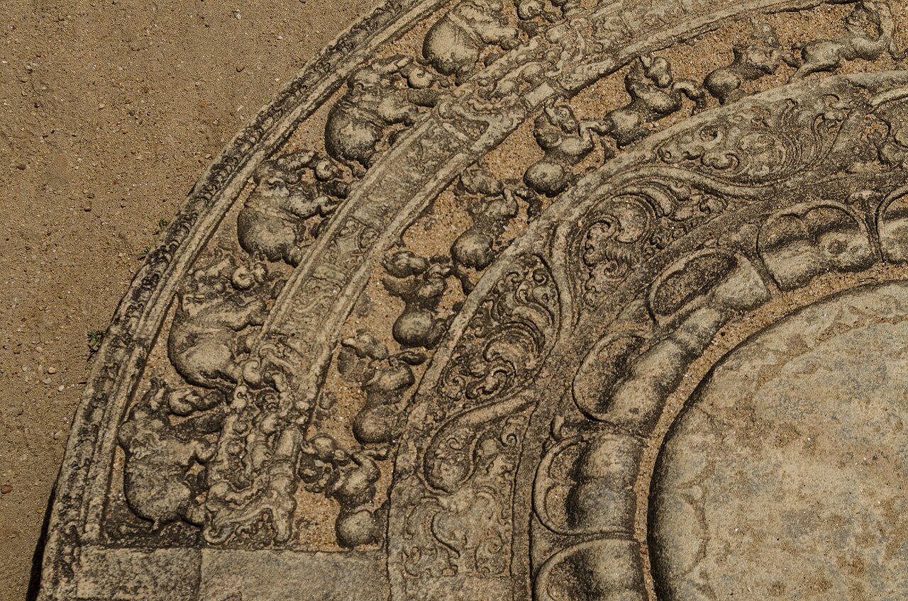 A carved sandakada pahana moonstone