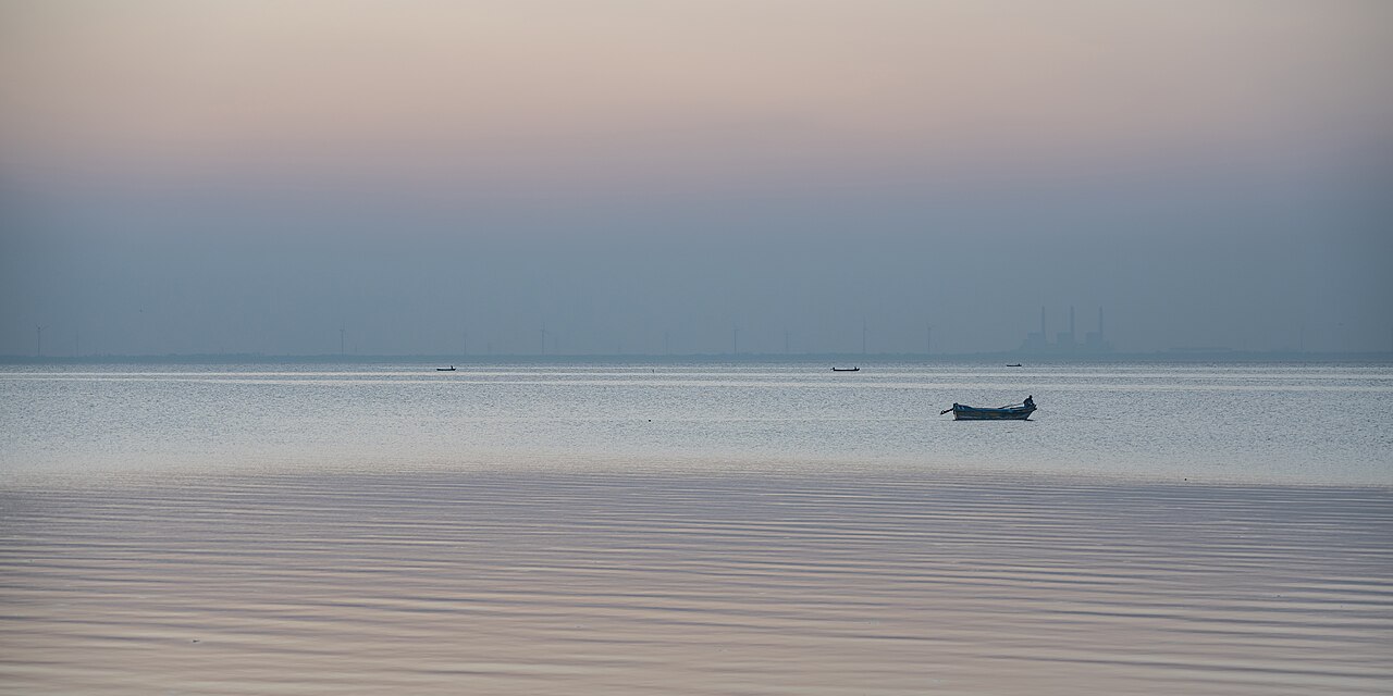 Fishing boats on Puttalam lagoon at sunset